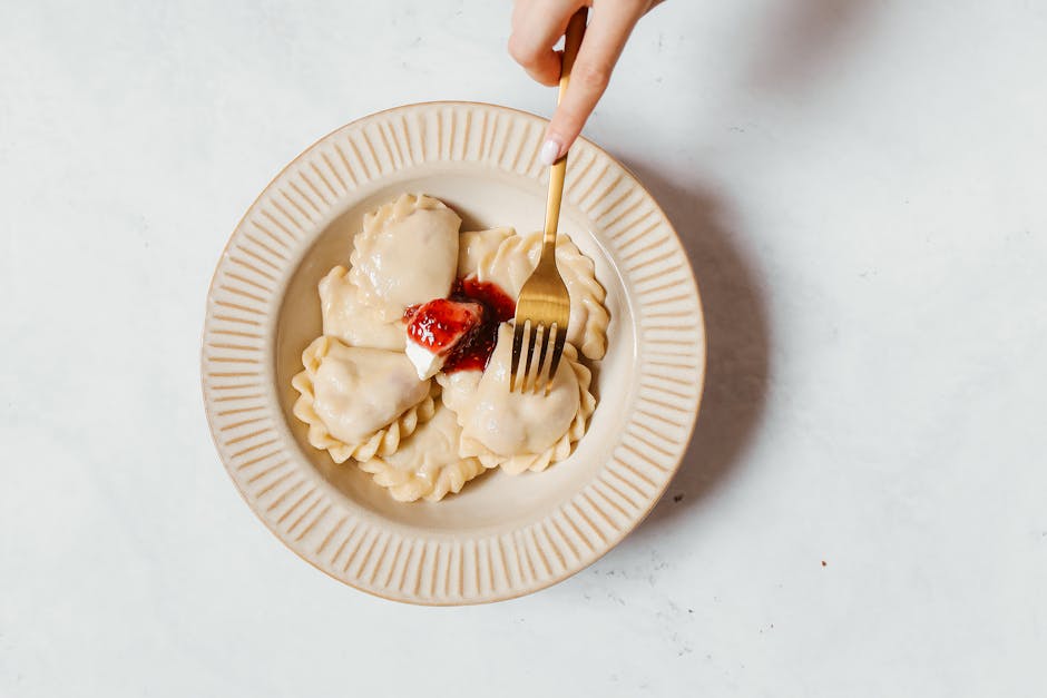 children eating traditional polish pierogi