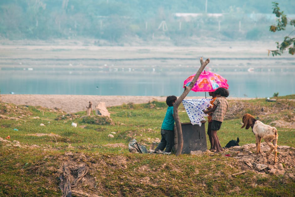 children playing by river