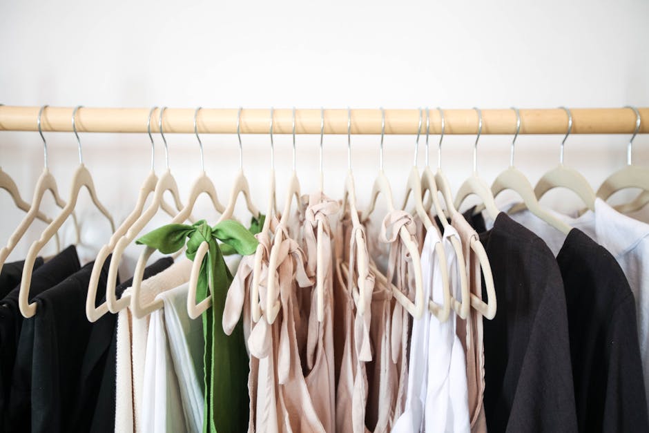 clothing racks with neutral colored garments