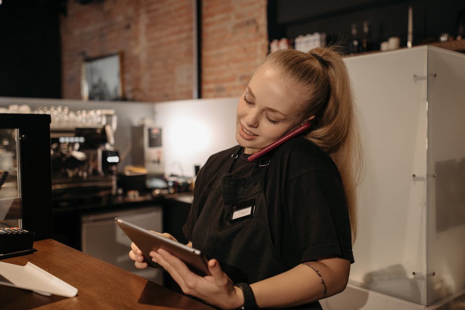 coffee shop owner managing online orders
