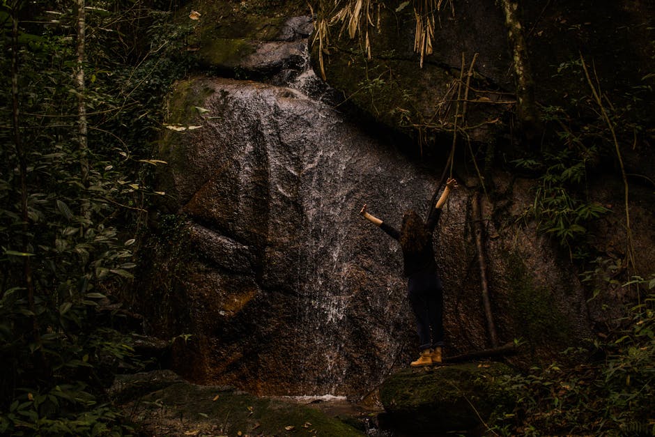 couple exploring a hidden waterfall in Brazil