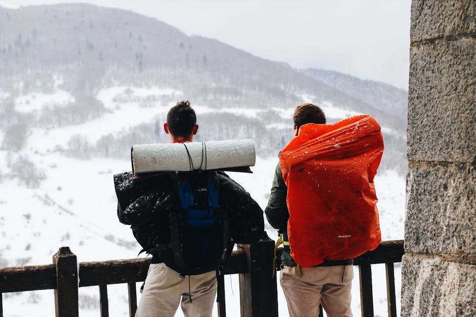 couple hiking in Polish mountains winter