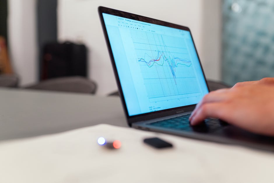 data visualization on computer screen with charts