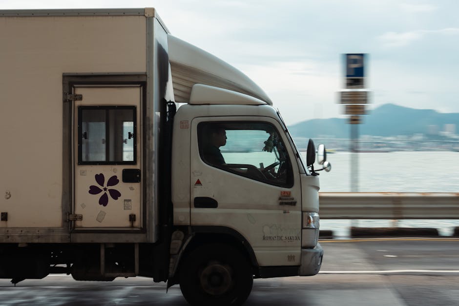 delivery truck on road with optimized route map