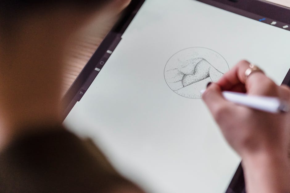 digital artist creating abstract art on tablet