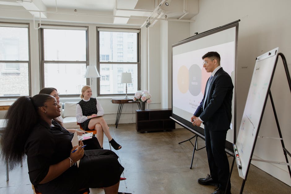 diverse team collaborating in modern office with digital tools