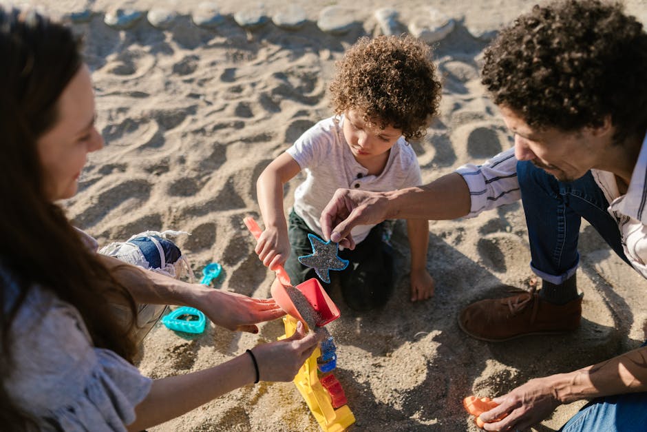 family playing on beach poland