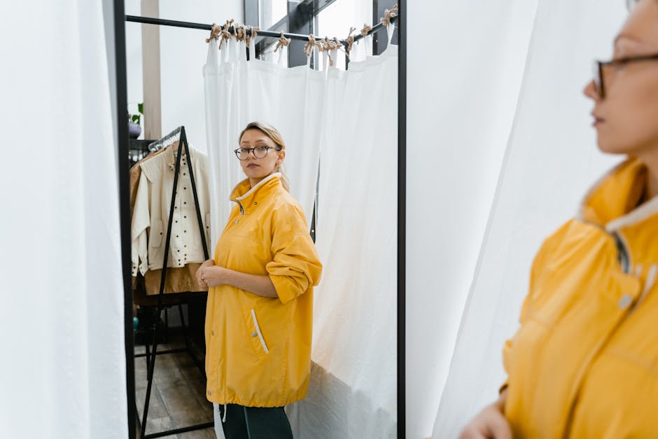 french woman checking outfit mirror
