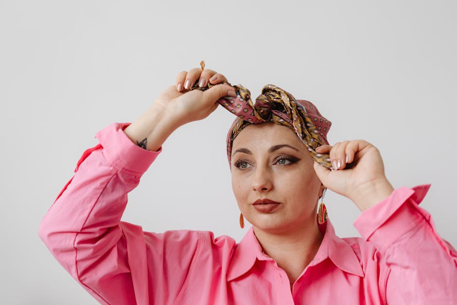 french woman tying silk scarf around neck