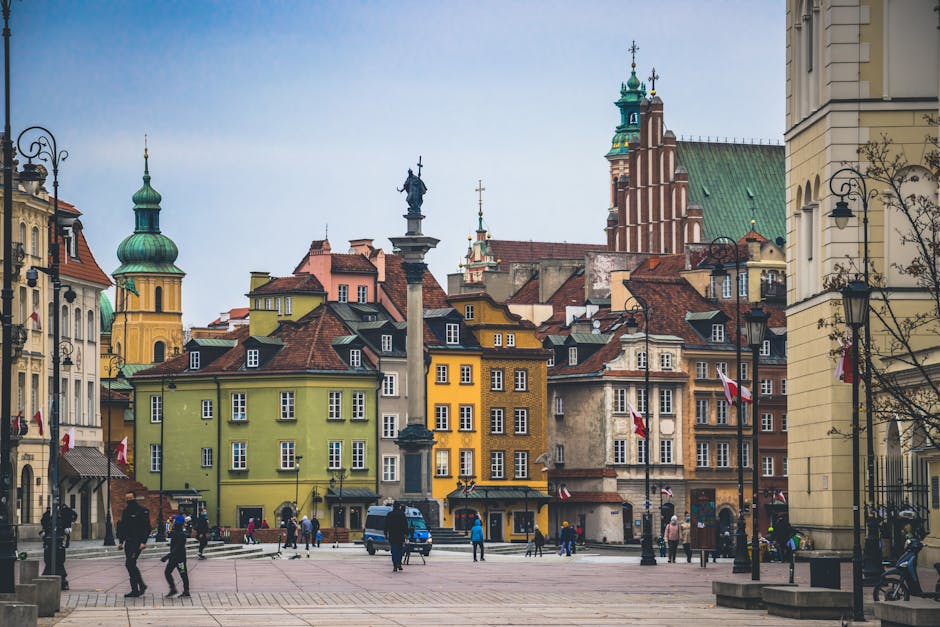 People walking on a vibrant street in Warsaw