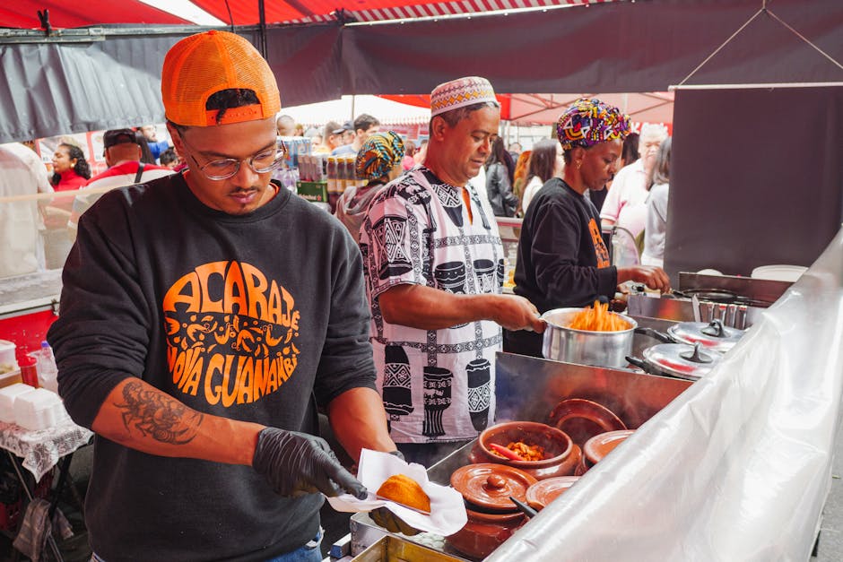 person eating traditional brazilian food at market stall