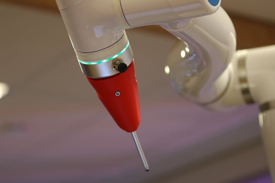 robot arm holding pen