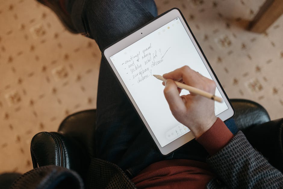 robot hand writing on digital tablet with person