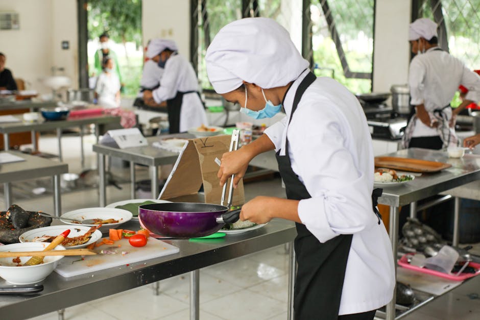 students cooking in hostel kitchen