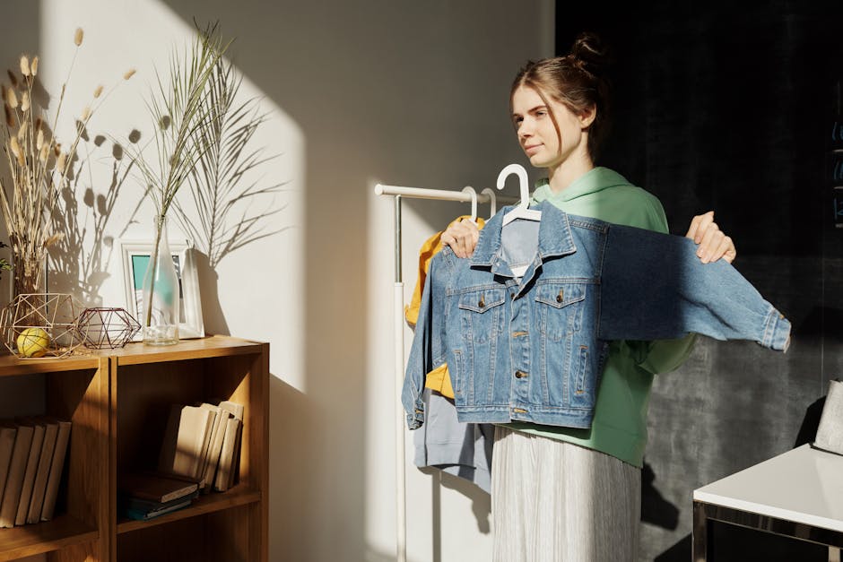 woman choosing clothes in a neat wardrobe