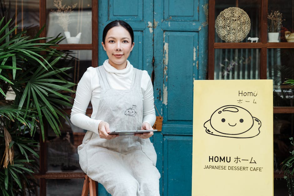 woman designing with AI on tablet in a cafe
