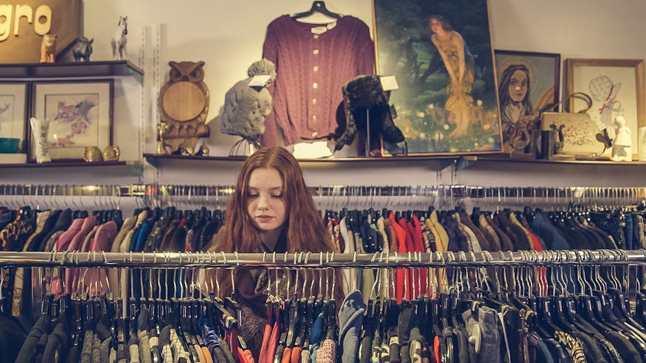 woman looking at clothes in vintage shop