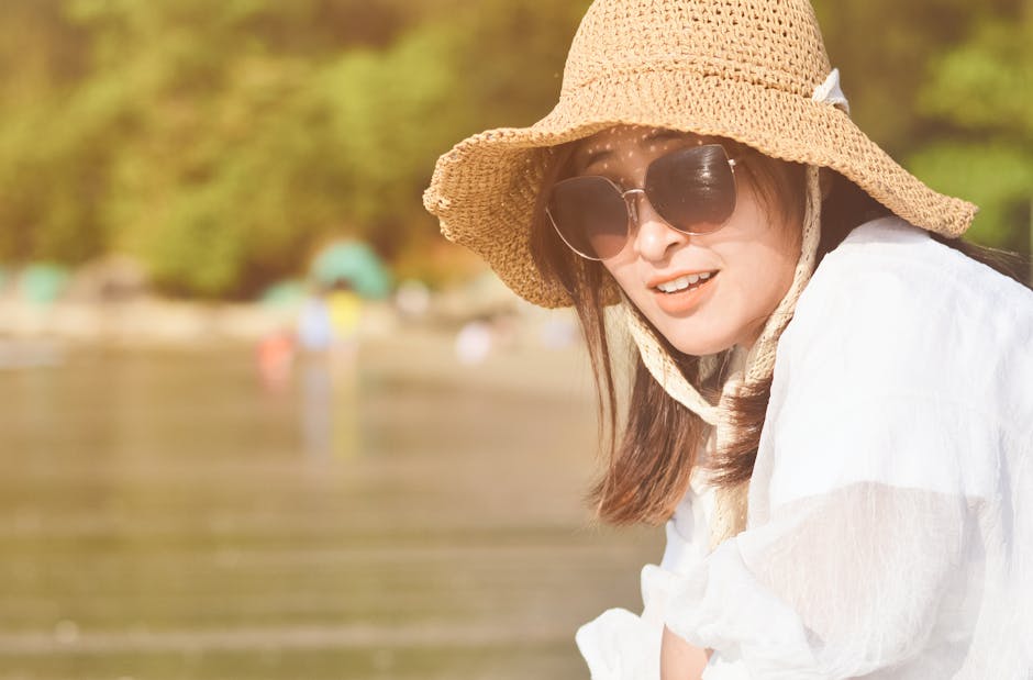 woman on summer beach wearing hat