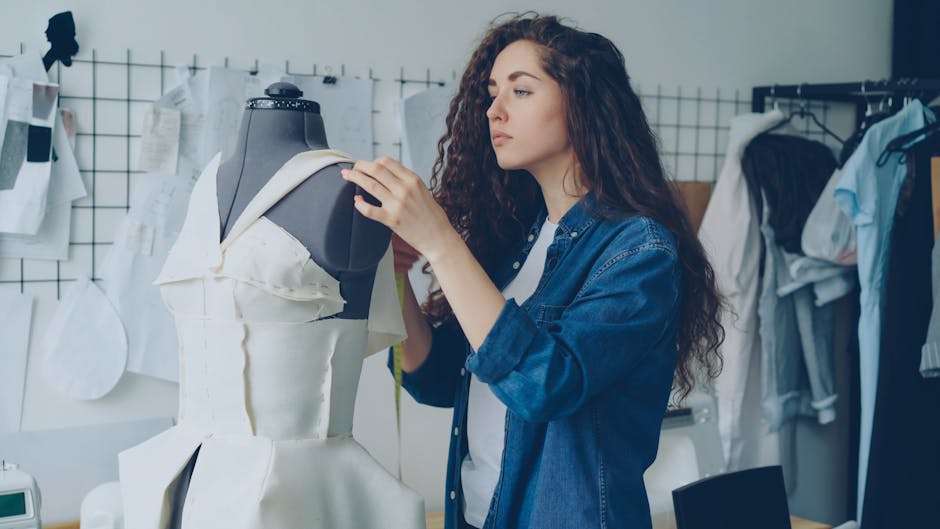 woman sewing denim jacket
