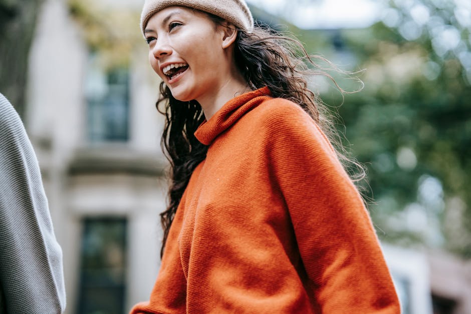 woman smiling wearing casual clothes outdoors