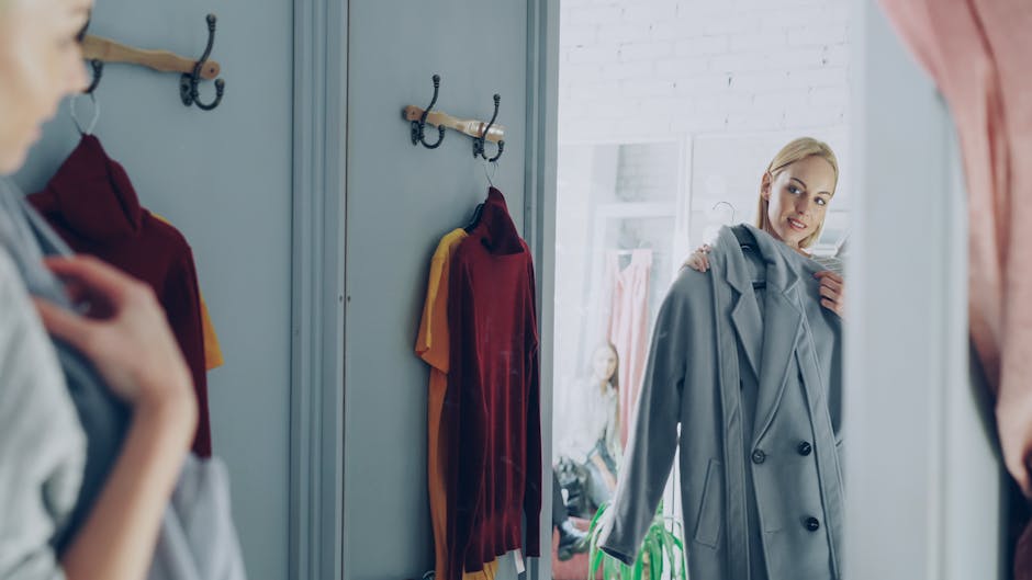 woman trying on clothes vintage shop
