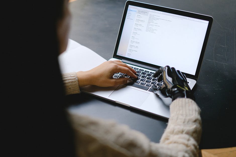 woman typing on laptop with AI assistant