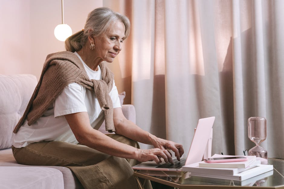 woman using AI art generator on laptop