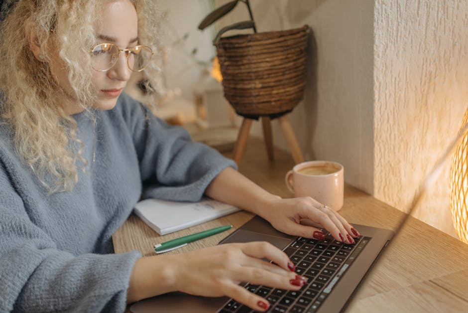 woman using laptop at desk