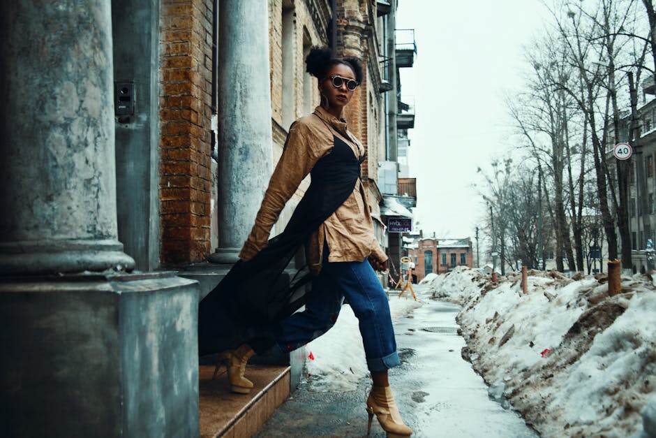 woman walking in city in stylish clothes