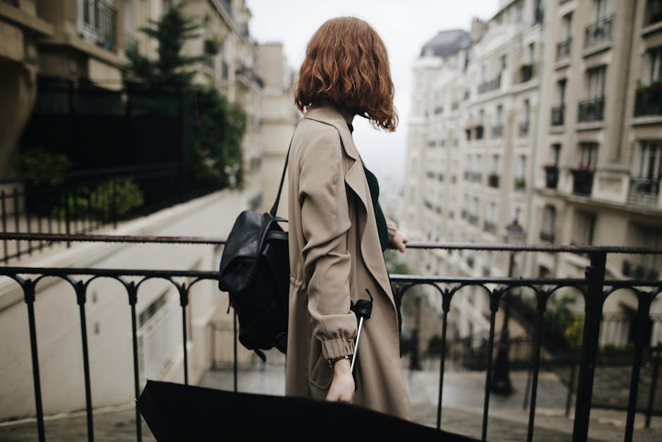 woman walking with small backpack in French city